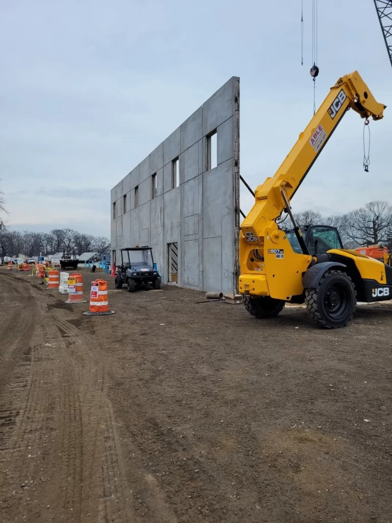 precast services using cranes to erect large precast panels.