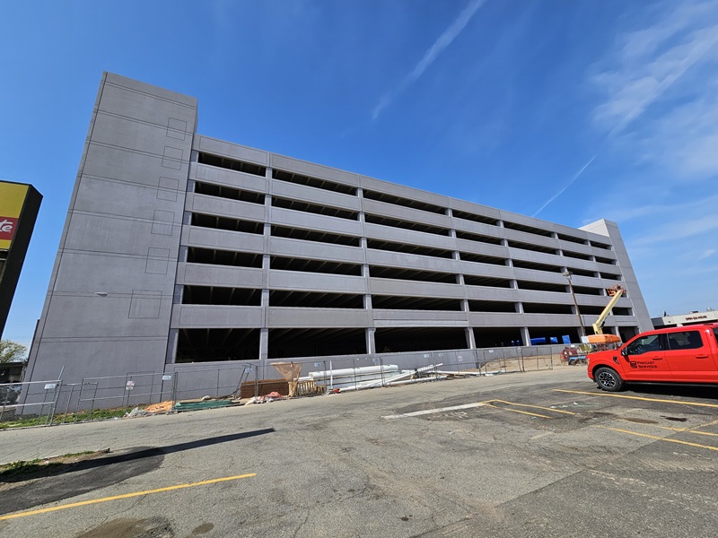 Crossing at Brick Church Station Parking Garage. Ground view, minor construction.