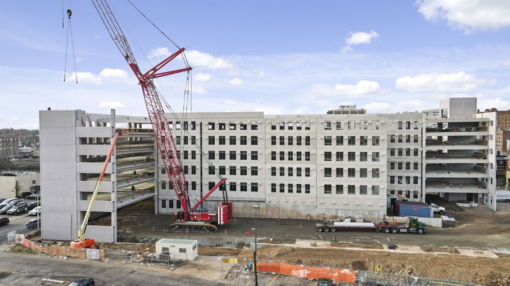 Crossing at Brick Church Station Parking Garage. Under construction with crane.